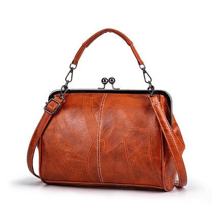 👜 2026 Uusi retrotyylinen klipsilaukku👛Yhdistää eleganssin ja käytännöllisyyden!